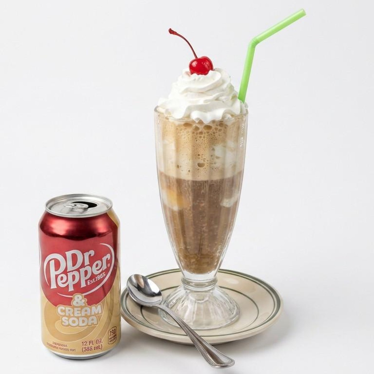 Dr Pepper float with whipped cream and cherry