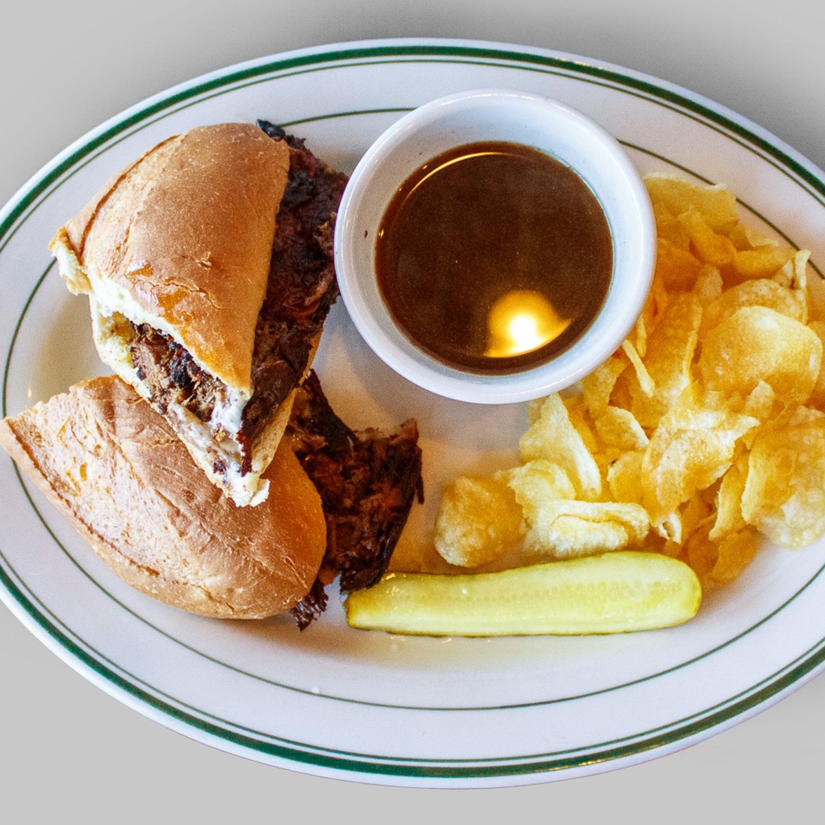 French dip sandwich plate with chips